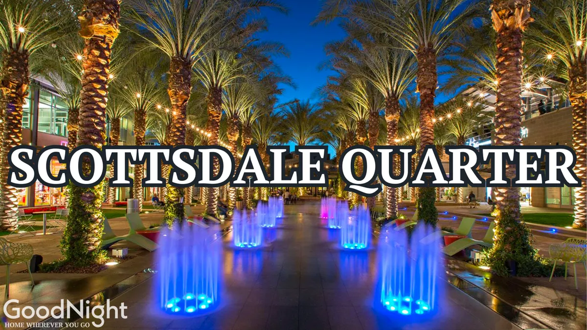 A festive exterior scene featuring illuminated fountains, palm trees, modern architecture, and colorful seating areas. The lively setting invites social gatherings, evening strolls, and dining experiences with a backdrop of Scottsdale’s distinctive nightlife.
